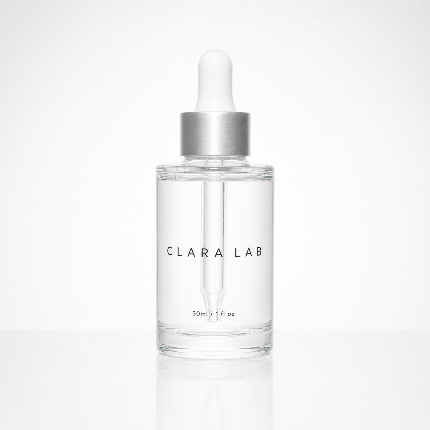 Clara Lab dropper bottle — clear glass, brushed aluminium collar
